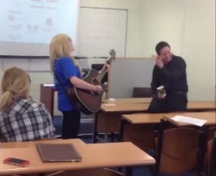 student serenades lecturer