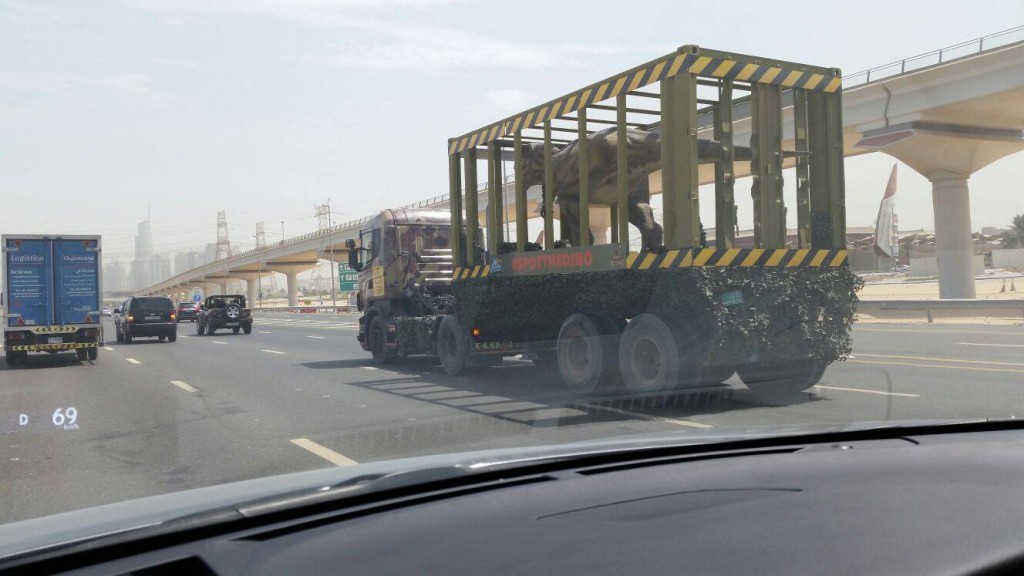 Dinosaur in truck on Sheikh Zayed Road Dubai IMG World of Adventures